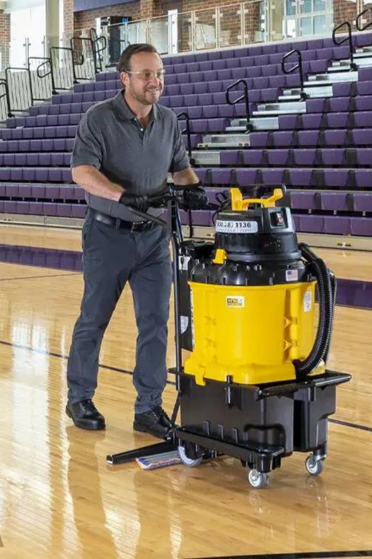 Stadium floor cleaning with professional scrubber machine